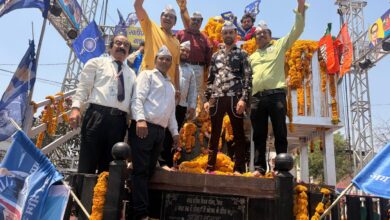 aap workers garlanding ambedkar statue on jayanti in dewas mp