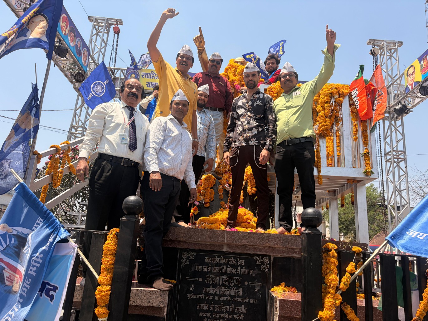 aap workers garlanding ambedkar statue on jayanti in dewas mp