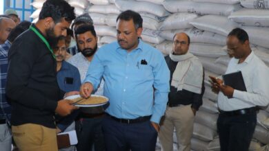 Collector Rituraj Singh inspecting wheat procurement center quality and weighing system in Dewas MP